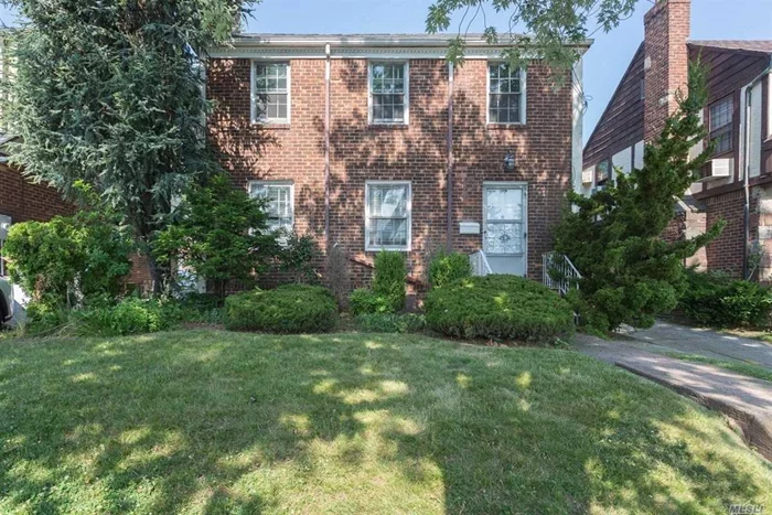 Solid Brick Colonial In Prime Convenient Location! Holds Three Handsome Bedrooms & One And A Half Bathrooms On 40X100 Lot. Living Room With Wood Burning Fireplace, Formal Dining Room, Good Closetry, 1 Car Garage & Nice Yard For Entertaining. P.S. 32 & I.S. 25.