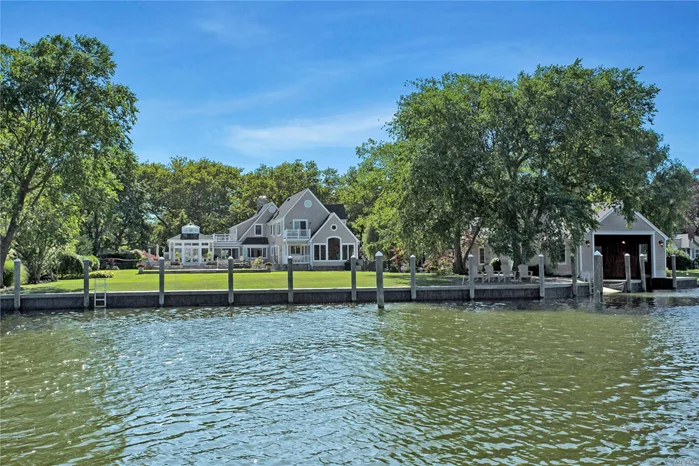 Beautiful Waterfront Home In The O&rsquo;conee Estates Area On 1.2 Acres, 5 Bedrooms, 5.5 Baths, Living Room With Fireplace, Family Room, Solarium Room With Fireplace & Radiant Heat, Formal Dining Room, Huge Eat In Kitchen With Fireplace, Gym, Office, Central Air... 4 Car Detached Garage & 16X44 Cut-In Boat Slip With Boathouse/Guesthouse Above Featuring A Bedroom, Living Room & Kitchen. The Perfect Backyard For Entertaining With An Extensive Patio, Inground Pool & All New 277&rsquo; Of Bulkhead.