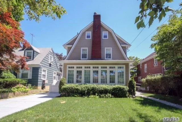 This Fabulous 4 Brs, 3 1/2 Bas Dutch Colonial Located In The Heart Of Bayside Only Blocks To Lirr & W/30 Mins To Nyc! House Completely Renovated, Gorgeous Lr W/Fp And Cozy Bright Sunroom, Hwf And New Windows Throughout. Modern Large Kit W/High End Appls & Large Dr. 2nd Fl Boasts Master Suite & 2 Brs & Ba. Oversized Br On 3rd Fl W/Lots Of Open Space & Storage. Fin Bsmt W/Full Ba And Sperate Entrance!Upgraded Electrical Panel W/New Wiring & New 3 Zoned Gas Heating. Prestigious Sd#26. Move Right In