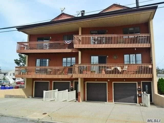 Winter Rental Townhouse With Oceanviews From Over-Sized Private Terrace, Kitchen, Hardwood Floors, Spacious Livingroom/Diningrm W/Fpl, Master Bedroom W/Private New Bath, Bedroom & New Bath. Lower Level Has Full Finished Den, Bedroom With Outside Entrance & 1/2 Bath. 1.5 Car Garage Plus Additional Parking. Shared Backyard Common Area..