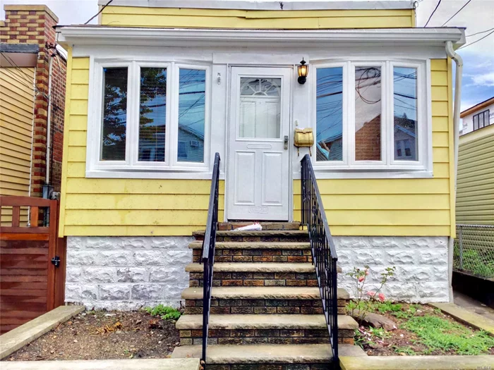 Excellent Condition, Recently Renovated Home. Located In Desirable Middle Village. Close To M Train, Buses And Conveniences. It Features A Single Level, Creatively Distributed To Accommodate Lr/Dr, Eik, 2 Bdrms, 1 Office, Eik, Full Bathroom, Plus A Nicely Finished Basement.