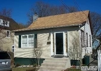 Cute As A Button Cape With 3 Bedrooms, 2 Full Baths, Living Room/Dining Room Combo, Eik And A Wood Deck Walk Out. Back Of The House Has A Downstairs That Has 2 Open Space And Full Bath. Yard Is Large.... Must See....