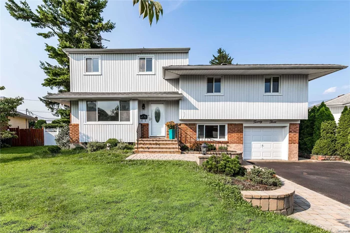 Rare 5 Bedroom Expanded Split In The Heart Of Plainview. Large Pie-Shaped Lot With Room For Pool And Much Much More. Renovated Kitchen, Central Air Conditioning, Den, And Attached Garage. Truly One-Of-A-Kind!