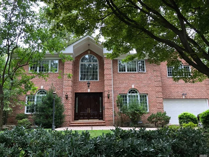 Custom Built 2002 Brick Colonial, Master Piece On Lake Success, Great Neck South School, Grand Entrance Gallery Hallway, Master Bedroom On 1st Floor, Gourmet Kitchen, Radiant Heat, 4Bedroom 3Bath On 2nd Floor, Great Room, Landscaping With Waterfall In Backyard, 2Car Garage, Finished Basement.