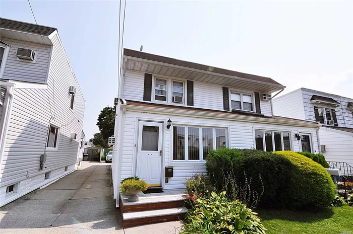 Lovingly Maintained, Spacious Mid-Block Semi-Detached Colonial Featuring 3 Bedrooms, 2 Full Baths, Eat-In-Kitchen And Formal Dining Room. Home Has A Full Basement With Laundry And Lots Of Storage. Skylights In The Kitchen And Second Floor Hallway. Near Schools, Shops, And Transportation.. School District 26 (P.S. 159, I.S. 25 Near-By). Sparkling Floors, Opened Concept