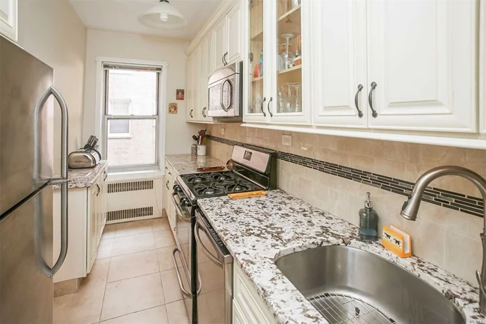 Top Location! Low Monthly Maintenance $698.30. Spacious 1 Br In Well Maintained Building. Fully Renovated Windowed Kitchen/Bath With Granite Counter Tops,  Apt Is Freshly Painted. Prewar Details That Include Arches, Sunken Living Room And Spacious Rooms,  This Building Is On A Quiet Tree Lined Street Just 1.4 Block From Queens Blvd, Just Steps From E F R M Trains, Lirr, 1 Block To Highways, 5 Min Walk From Ps196. Laundry Facilities And On Site Super.