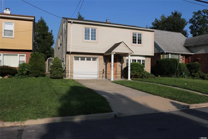 Bright One Family Detached Stucco Split Home Features A Total Of 3 Bedrooms, 2 Full Bath, 1 Half Baths, Eat In Kitchen, With A Living Room/Dining Room, Finished Basement, Built In Garage, Double Car Private Driveway,  Deck In The Backyard, And A Gas Boiler. 0.4 Miles To Q12 On Northern Blvd, School District #26! Mandatory Credit And Income Verification.