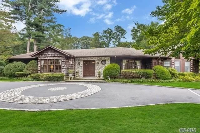 Your Own Private Oasis; An Expanded 5Br, 3.55 Bath Ranch W/Guest Wing For Extended Family Sitting On 2 Plush Professional Landscape Acres W/Waterall & Fish Pond. Semi-Open Floor Plan For Entertaining, Hardwood Floors Thruout, Cac, Sunroom, Bluestone Patio, Circular Driveway. Much More! Locust Valley Schools.