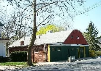 Garage Door Leading To Perfect 1, 400 Sq Ft. Warehouse/Studio Space. Driveway With 4 Parking Spots. Tenant Pays All Utilities.