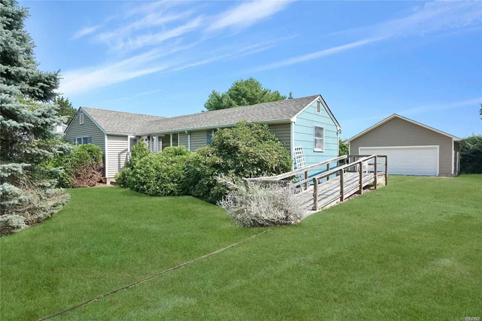 Ranch Home With Open Layout, Large Eat-In Kitchen, 2 Bedrooms, Living Room With Fireplace, Large 2 Car Garage Overlooking Forever Farm Views & Close To All The Wonderful Things The North Fork Offers.