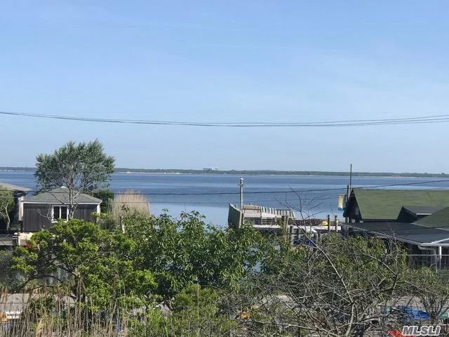 Beautiful Contemporary Turn Key With Guaranteed Unobstructed Views Of The Great South Bay And Sunsets. Very Private And Spacious To House Your Family Comfortably. 2 Wrap Around Decks Great For Entertaining!