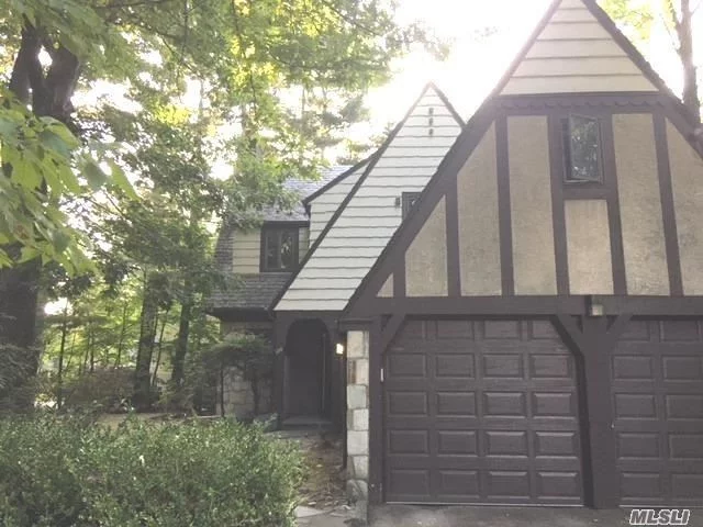 Charming Tudor And Private Sunny Backyard/ Patio. And 2 Car Attached Garage. New Refrigerator And Dishwasher Installed. Must See.