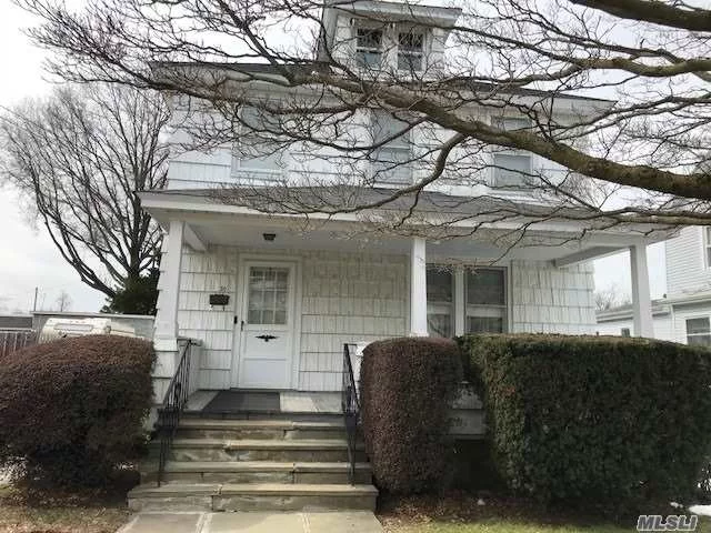 Income Potential Alert! Income-Producing 2 Family Home On Beautiful Street. Spacious Rooms And Closets Galore! 1 Car Detached Garage, Deep Property, Hardwood Floors, Attic, Full Basement, Front Porch. Opportunity Knocks!