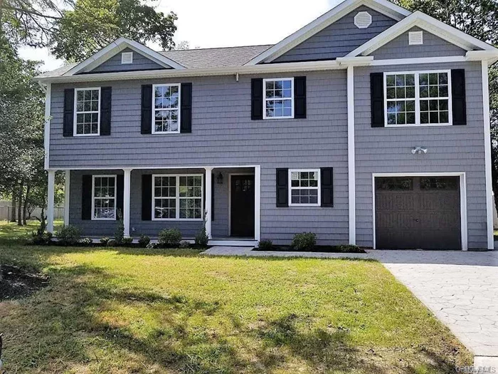 Beautiful New Colonial W/Front Porch, Bright Open Floor Plan. Amazing Large Eik W/Center Isle, Granite & Ss Appliances. Hardwood Floors, Crown Moldings, Stone Fireplace W/Built In Shelving, Hi Hat Lighting, Laundry Rm W/Pantry, 3 Large Br&rsquo;s, Master Suite W/Walk In Closets & A Dream Bath W/Tub & Shower. Many Closets, 200 Amp Electric, & Stamped Concrete Driveway & Walkway.