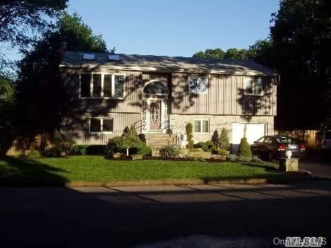 Hi-Ranch Beautiful Condition, 5Br, 2 Full Bath, Hardwood Floors, Vinyl Siding With Stone, Exquisite Second Story Deck.