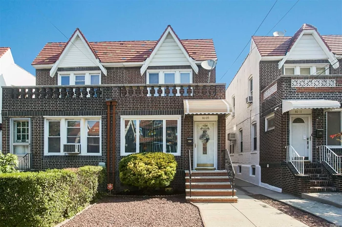Beautiful Semi-Detatched 3 Bedroom Brick Home That Features A Kitchen With Granite Counters And Stainless Steel Appliances, Beautiful Hardwood Floors 2 Modern Bathrooms And A Finished Basement With Wet Bar, Plus This Home Has Central Air , 2 Blocks From Express Bus To Manhattan And Zoned For Ps113