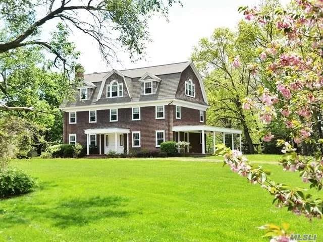 Old Westbury. Built In 1900 This 7 Bedroom Colonial Is Set On 3 Flat Acres. This Home Features Living Room With Fireplace, Formal Dining Room That Opens To An Expansive Wrap-Around Porch, Large Eat-In-Kitchen, 6 Bedrooms, And A 7th Master Suite With Full Master Bath On The 3rd Floor. This Property Offers Many Opportunities!