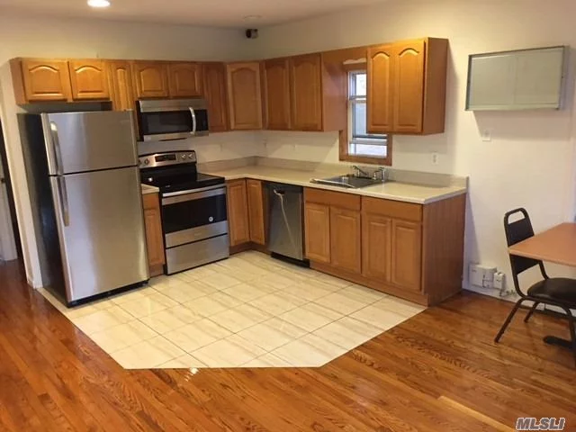 Fully Renovated Apartment, Brand New Stainless Steel Appliances, Laundry Hookup, Hardwood Floors Throughout Apt! Close To Shopping Centers, Places Or Worship And Schools. 5 Min To A Train And 2 Min To Lirr 2 Min To Nypd Precinct