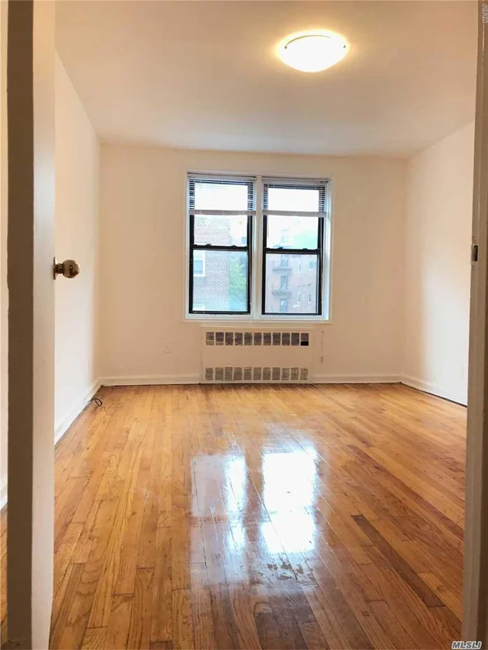 Beautiful & Spacious One Bedroom Condo In The Heart Of Rego Park. Close To All, Transportation, Malls, Restaurants, Supermarket. 63 Dr. Subway Is Only 2 Blocks Away.  Large Living/Dining Room, Bedroom, Eat In Kitchen & Full Bath.