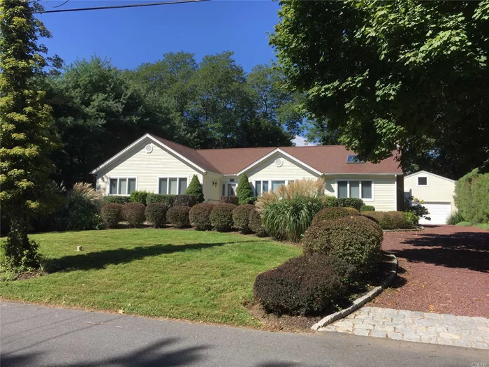 Spacious, Open Layout With High Ceilings In This Lovely 3 Bedroom, 2 Bath Home. Features Private Backyard, Beach Rights At Community Beach Within Walking Distance, Wood Floors Throughout,  Huge Dry Basement, Billiard/Sun Room, 2 Car Garage With Loft Space And Much More.