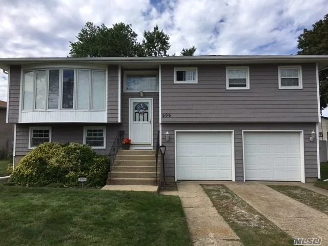 Mint Home With Many Upgrades. Custom Kitchen And Baths. New Vinyl Siding, New Carpets, Heated Above Ground Pool, 7 Zone Inground Sprinklers, 200 Amp Service. Too Much To List. Must See!