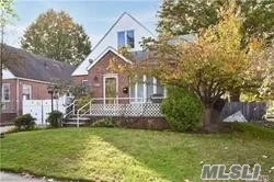 Fully Renovated, Spectacular, Spacious Detached Cape In Bayside Hills. Living Room, Formal Dining Area, Eat-In-Kitchen, Granite Counters. Hardwood Floors. Features 6 Bedroom And 2 Full Bath, Sd#26, Ps 203. A Must See.