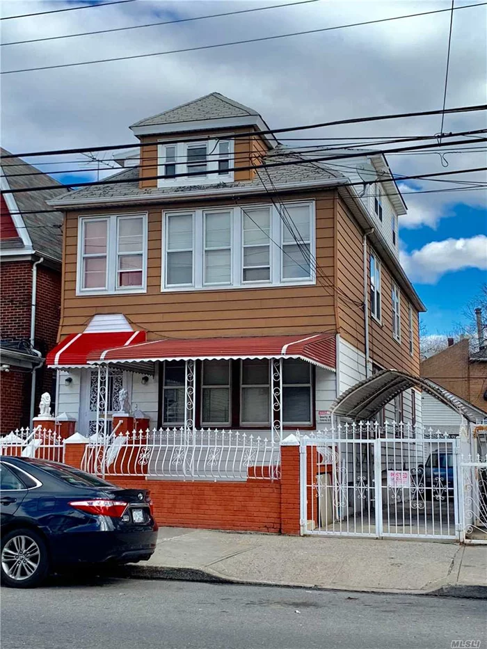 Well-Maintained Legal Two Dwelling In An Excellent Location In Elmhurst, Has 2.5 Stories Over A Semi-Basement, A Private Driveway And A Garage, Low Property Tax, House 20Ftx52Ft, Lot 30Ftx88Ft, Zoning R5. It Is Convenient To Malls, Shops And Public Transportations.