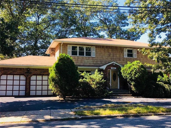 2 Family House In Syosset School,  New Roof , New Kitchens, New Baths.Full Finish New Basement With All Cos