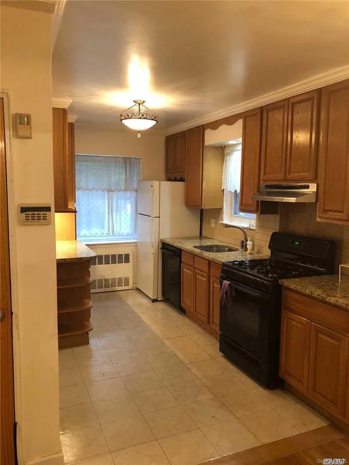 Driveway Available - Excellent Condition - 3 Bedroom, 1.5 Bathrooms. First Floor Apartment - Granite Kitchen, Updated Bathroom, Master Bedroom With Half Bath, 2 Additional Bedrooms, Separate Dining Area, School District 26!!