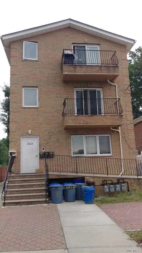 Second Floor Three Bedroom - Two Full Baths - Living Room - Eat In Kitchen - Open Dining Room Apartment. Beautiful Hardwood Floors In Bedroom & Granite Throughout. Coin Operated Washer & Dryer Available In Basement. Garage Spot Available For Extra Rent. Triple Mint Condition.