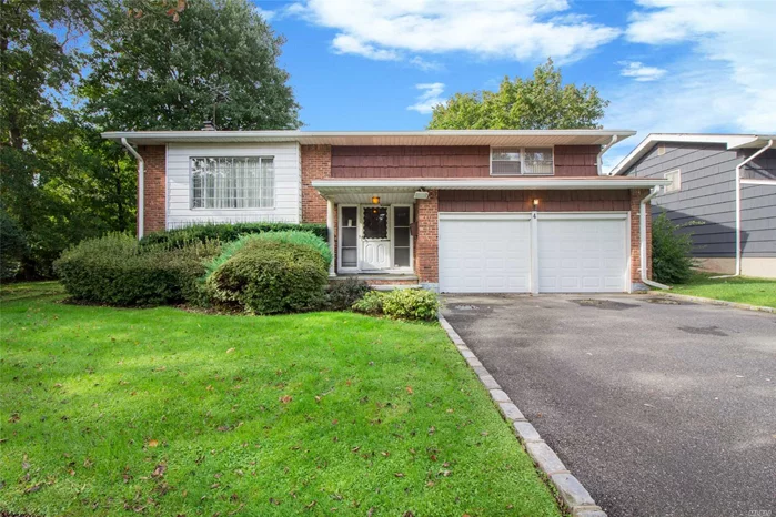 Perfect Opportunity To Own This Light & Bright Over-Sized Raised Ranch W Soaring 10Ft Ceilings On Main Level. Home Features Large Eat In Kitchen, Cac, 2 Car Garage & Large Property. Potential Galore!! Possible Multi-Generational Home. Conveniently Located Near Highway, Shopping & Library. Award Winning Syosset Schools.