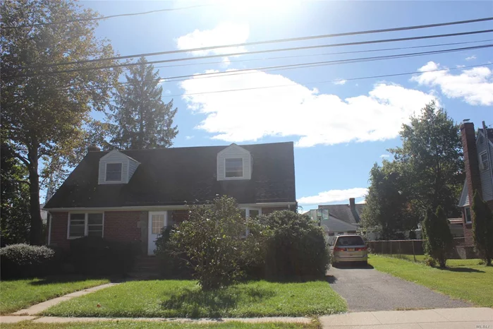 Newly Renovated Large Expanded Cape With 5 Bedrooms, Walking Distance To Syosset Training Station. Available Now!!!!