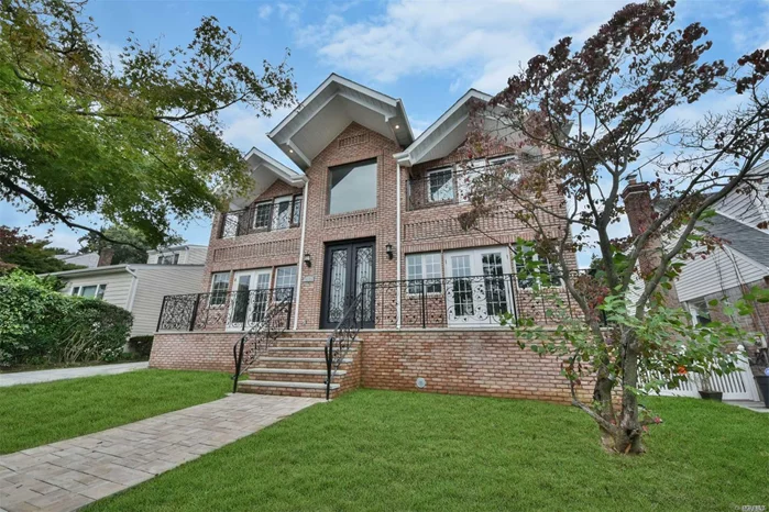 This Stunning Home Was Rebuilt In 2018 With Meticulous Craftsmanship. Spacious Kitchen Is Equipped With Stainless Steel Appliances. Luxurious Living Spaces With Extraordinary Architectural Details Throughout. Conveniently Located To Transportation, Supermarkets And Restaurants. A Must See!