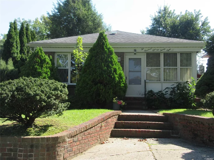 This Corner Lot Home Features A 2 Car Garage!!! Located On A Beautiful, Well Maintained Street. Close To Bay Terrace, Shopping And Transportation. Drink Your Morning Coffee In Your Enclosed Porch Or Sit In The Living Room Surrounded By Tons Of Natural Sun Light. Roof And Windows Are Only 10 Years Old. Hard Wood Floors Under The Carpet. This Home Is Waiting For Someone To Come And Make It Their Own. You Will Love The Large Sized Lot And 2 Car Garage.