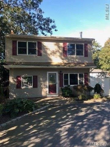 Move In Ready Colonial W/Perfect Deck And Yard For Entertaining! Home Boats Master W/Bth, 2 More Bedrooms, Wood Floors, Nice Size Kitchen W/Island. Living Room W/Wood Burning Stove And Formal Dining Room. Lots Of Sq Footage For The Price! Come See For Yourself.