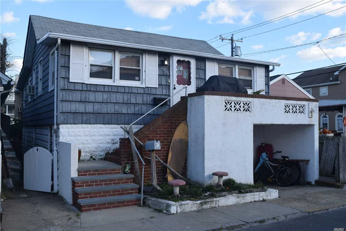 Steps To Beach, Renovated Kitchen & Baths, New Ceramic Tiles Finished 1st Level, , Parkay Floors.Spacious Living Room, Large Bright Enclosed Sunroom W/Stunning Oceanview, 1 Car Garage , Wide Block. 5 House To Ocean. Walk To All. Won&rsquo;t Last !!!