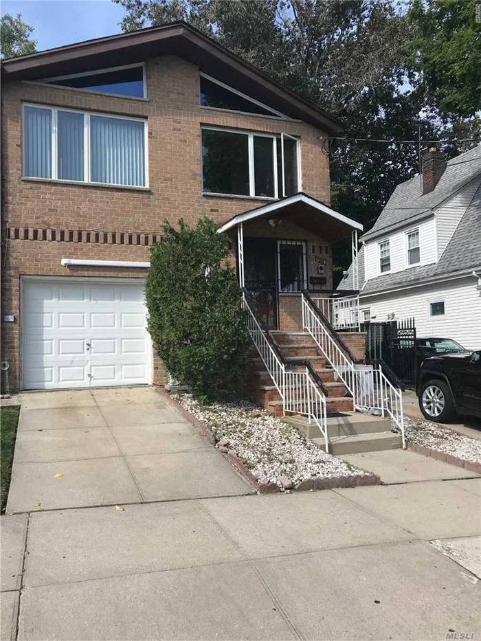 Fully Renovated Brick Semi-Detached Two Family House With Private Long Drive Way. Wood Floor Throughout. Full Finished Basement With Separate Entrance. 1st Fl: Lr, Ki, 2Beds, 1Bath 2nd Fl: Lr, Ki, 3Beds Convert To 2Beds, 1 Bath 1 Block To Ps 129, Close To Transportation, Park, Shopping Center, Etc.
