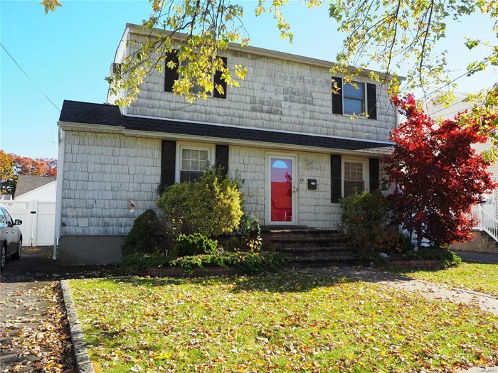 Spacious Expanded Cape. Family Room With Wood Burning Fireplace. Eik. 10 Year Old Roof. 10 Year Old Skylights. New Hot Water Heater. 12 Year Old Fence. Deck. Skylights. Gas Dryer And Stove. Hardwood Floors On First Floor. Mid-Block Location. Master Bedroom W/2 Walk-In Closets. Close To Shopping Lirr And Highways. Central Boulevard Elementary School. Owner Reduced To Sell.