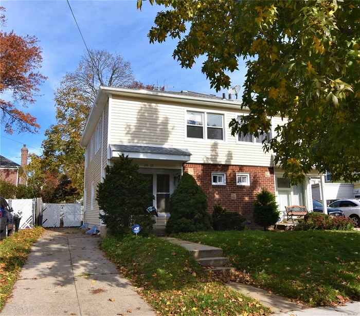 Charming Semi-Attached House In Center Of Bayside Neighborhood. South Exposure! Lot Of Sunshine! Open Kitchen. Hardwood Floor Through Out. Private Backyard. 2 Mins Walk To Oakland Lake Park. School District 26 ( P.S.31, M.S.158, Bayside High School). Public Trans Q12, Q13, Q31, Q27. 8 Mins Walk To Lirr. One Block Away From Northern Blvd. Close To All!