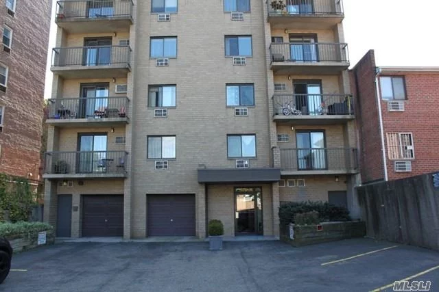 Young Condo Building Convenient To Transportation! Laundry Room In Building! Beautiful Apartment With Wood Floors And Balcony!