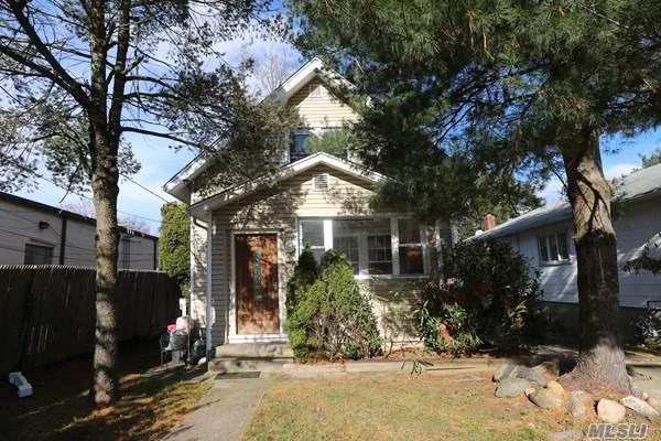 Charming Colonial In The Prestigious Roslyn School District. This Home Features Family/Living Room, Office/Bedroom With Fireplace, Renovated Kitchen W/Granite Counters, 2 Bedrooms Upstairs With Full Bath. Membership To The Highly Sought After East Hills Pool/Park. Great Opportunity!