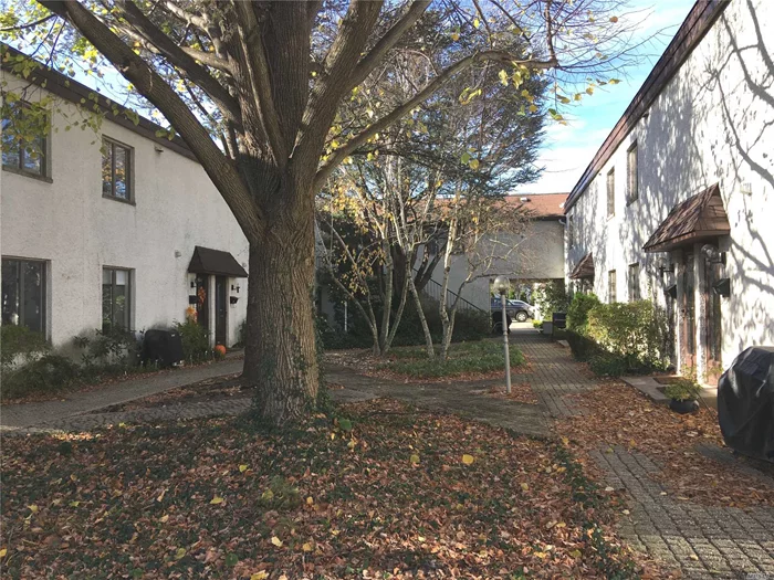 End Unit In Courtyard. 1 Bedroom Loft Apartment On The Creek. Laundry Facility On Premises. Parking Garage Available For Additional Monthly Fee.