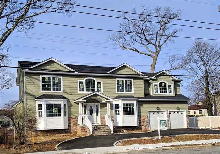 Massapequa Woods Energy Star New Construction In Mass Sd#23. Lg circular driveway w/2 car gar & dramatic circular staircase In 2 story foyer. Quality workmanship Incl oak stairs & banister in bsmt, built ins by fpl In great Rm & mud rm & Pella wndws. Conv To RR & major Roadways / mid block location. A dream of a master suite w/lrg WIC, Dbl closet & fbth. Laundry on 2nd floor. New dark stainless Samsung Appl inc French door fridge. Stainless farm sink. 2 zone gas heat & CAC. Very near completion.