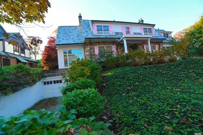 Rare Find- Jamaica Estates North!!! Central Hall Revival Home. Home Is Situated On An Over Sized 123.75&rsquo;X 223.67&rsquo; Property. Home Features Include 5 Bedrooms 3 Full & 2 1/2 Baths Including A Mud Room & Maids Quarters With Service Staircase. Formal Living / Dining Room, Fireplace, Den, & Eat In Kitchen. Master En-Suite Bedroom With Fireplace. 5 Split System A/C&rsquo;s. Street Level Basement With Separate Entrance & 2 Car Attached Garage. Basement Amenities Include Family Room, Wet Bar, 7 Laundry Room.