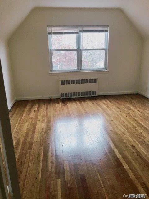 Beautiful Residential Area. Updated Kitchen, Dinning Room, Two Bedroom, One Full Bath With Hard Wood Floor. Close To Lirr, School, Northern Blvd.