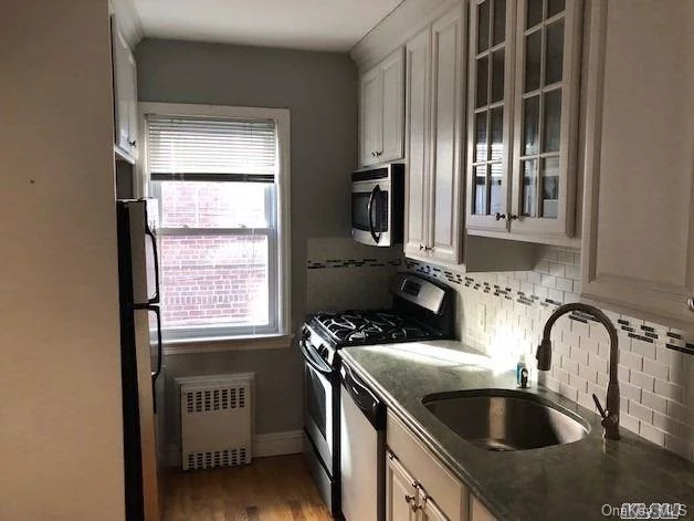 Utilities Gas, Electric, Heat Additional $50/Month. Freshly Painted, Spacious 1000 Sq Feet On 1st Floor Available For Rent Immediately. 1 Car Garage Parking Available For $150. Sunny Apartment, Very Clean. Hardwood Floors Throughout! Convenient To Transportation And Shopping, Bell Blvd, Lirr Bayside Railroad. Must Be Qualified!