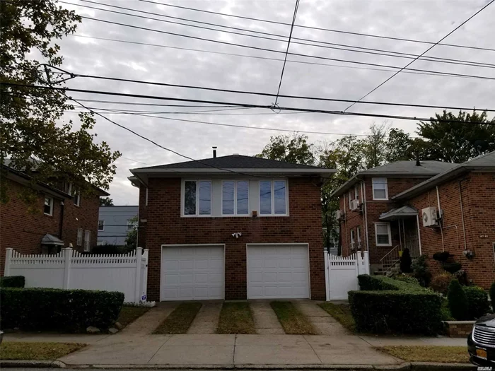 Rare Find In The Heart Of Flushing. Close To All Transportation And Shopping.Unique 2 Family Solid Brick 2 Family Split Duplex. 1st Flr Is A Duplex W/Lg. Eat In Kitchen On The First Level And 2nd Level Has A Full Bath, Bedroom And Living Rm. Owners Apartment Has 3 Bedrooms, 2 Full Baths, Formal Dining Rm., Lg Eat In Kitchen..Fully Functional Basement W Sep. Ent.