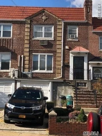 Beautiful One Family Brick Townhouse In Woodside. 3 Bedrooms, 2 Fullbaths, Finished Basement, With Garage And Private Driveway. Move-In Condition With Lots Of Updates. Close To All. Must See!