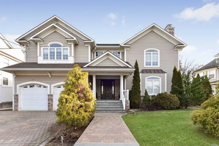 Curb Appeal Abounds In This Huge Colonial! A Work In Progress For You To Finish To Your Own Personal Taste! Beautiful Windows & Arches With Lots Of Light Highlighting The Flow Of The Main Floor. Gorgeous Fireplace, Wood Floors & More! Stake Your Claim To This Oyster Bay Beauty!