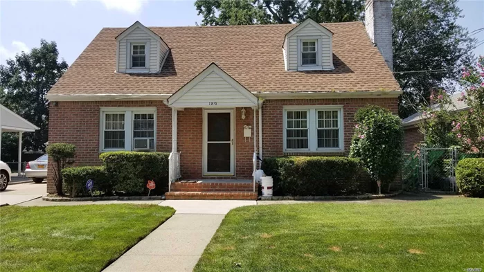 Completely Renovated And Extended Brick Wide-Line Cape. Basement And First Floor Extended. Outside Entrance To The Basement(Renovated Seven Years Ago). Near Chaminade, Hospital, Park, Library, Schools, Long Island Rail Road. Custom Granite And Stainless Steel Huge Eat-In Kitchen, Very Extended. A Must See To Appreciate.